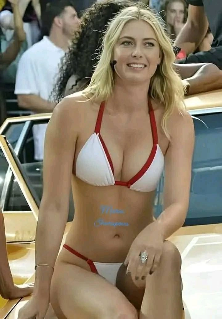 Tennis beauty Maria Sharapova shows off her enviable toned figure in a black bikini